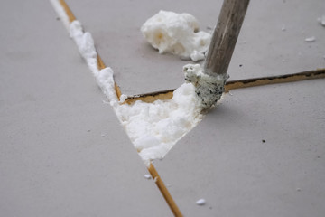 Roofing insulation, installation of insulation sheets on foam