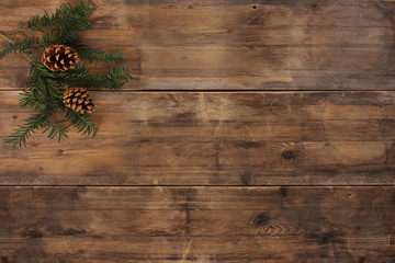 empty mock up in beautiful christmas composition with cones and fir branch on old wooden table,...