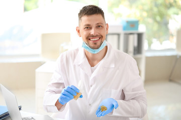 Doctor with pills in clinic