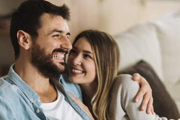 Obraz premium Close up of a loving happy couple talking to each other at home
