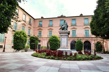 Fototapeta na wymiar Cardinal Belluga statue in the square of Episcopal Palace