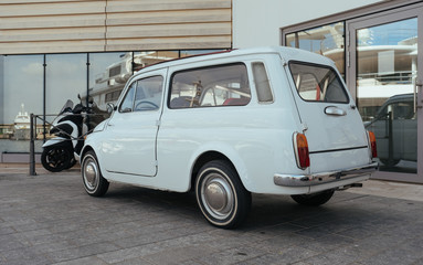 Fototapeta na wymiar Old small white car in Monaco, Monte-Carlo