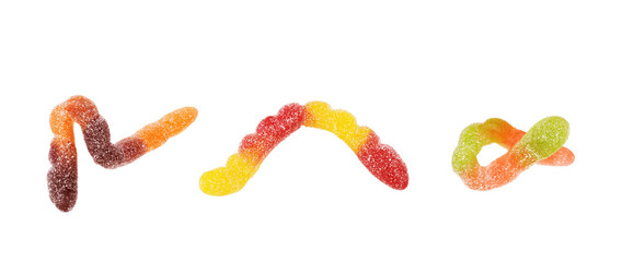 Collection of multi-colored jelly worms on a white background