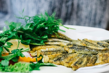 Turkish traditional sea food Hamsi from Karadeniz Sea (Blacksea), fried european anchovy