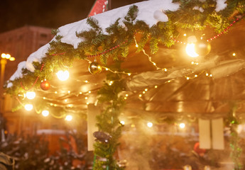 Christmas decorations on the street, colorful holiday bokeh lights, city night illumination