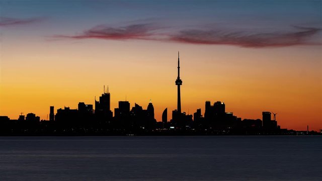 4K Timelapse Sequence of Toronto, Canada - The Skyline of Toronto at Sunrise as seen from Humber Bay Park