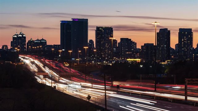 4K Timelapse Sequence of Toronto, Canada - The 401 Highway in the north of Toronto from Day to Night