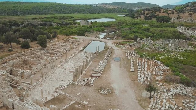 The ruins of the ancient theater of the Lycian civilization in Patara in Turkey. Patara Antique City. Aerial view
