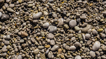 Pebble stones on the beach. Summer time concept.  