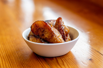 Side of Fried Plantains in a small bowl