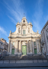 Fototapeta na wymiar CATANIA, ITALY - APRIL 7, 2018: The baroque facade of church Basilica Collegiata.