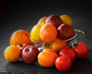 Beautiful Fresh fruits Assorted fruits in a gray table.