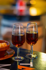 Christmas sherry wine, dry or sweet jerez fortified wine in glasses and street lights, Jerez de la Frontera, Andalusia, Spain