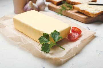 Tasty fresh butter on table