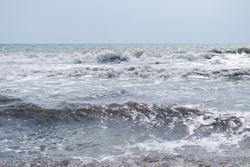 waves breaking on the beach