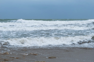 waves breaking on beach