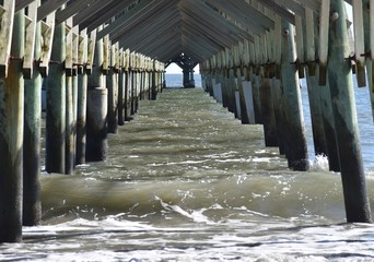 water in winter. pier in winter. 