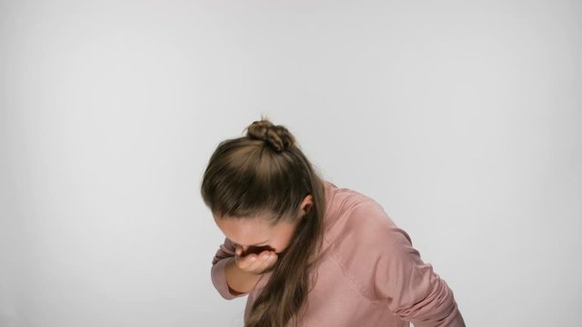 portrait of a woman who funny sneezes