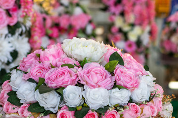 Beautiful artificial pink and white rose bouquet.