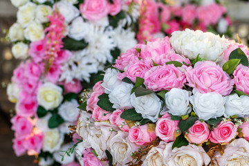 Beautiful artificial pink and white rose bouquet.