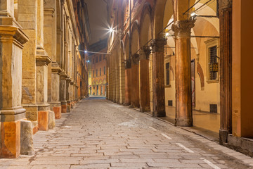 Bologna -  The porticoes of old town in the morning.