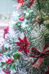 Christmas tree decoration, colorful ornaments on Christmas tree in street.