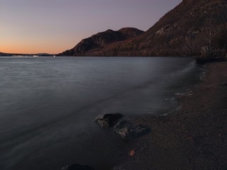 Fototapeta na wymiar sunset on river valley beach 