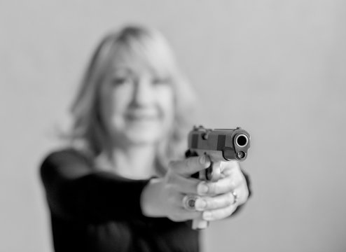 Woman loves to shoot her big gun 