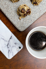 Fototapeta premium coffee mug cell phone iphone cookies marble