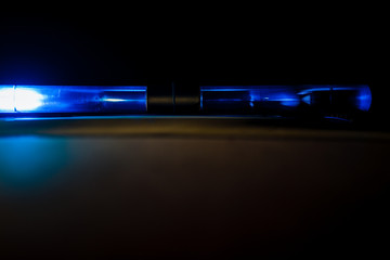 Flashing blue siren light