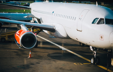 Side view of an jet airplane on a sunny day