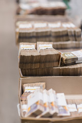 Carton boxes full of various types of banknotes