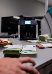 Euro &euro; money in front of a counting device