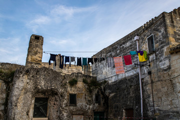 Drying laundry hanging in the street of Matera old town, South Italy