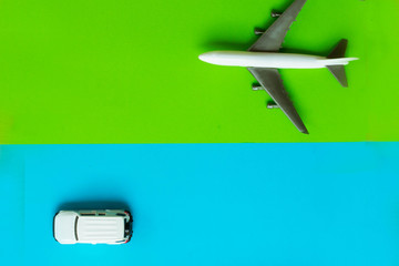 Top view of scenery on a colorful background and space for copy. Pack your travel products seamlessly with blue and green.