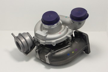 New car turbo kit, motor turbine set with blow off valve close up on white background