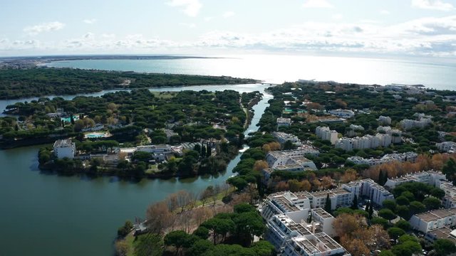 Aerial view of a residential area in la Grande Motte south of France pine trees and mediterranean sea