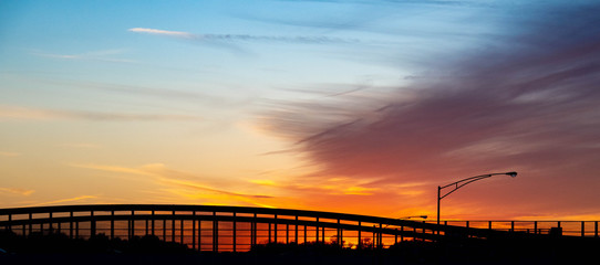 Fototapeta na wymiar sunset over bridge