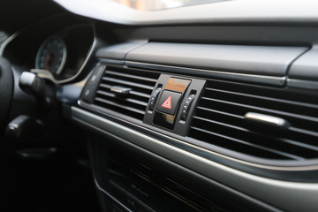 Fototapeta na wymiar Hazard lights button in the car