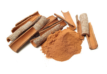 Cinnamon Sticks and Ground Cinnamon on a white background