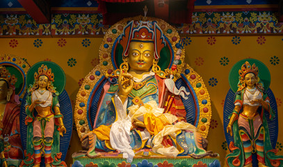 Buddha images in traditional Tibetan style in Khumjung monastery inside Sagarmatha National Park, Nepal. 