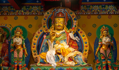 Buddha images in traditional Tibetan style in Khumjung monastery inside Sagarmatha National Park,...