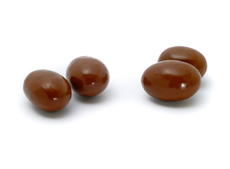 chocolate ball or chocolate bonbon on a background.