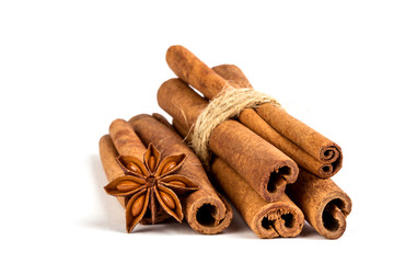 Close up the brown cinnamon stick with star anise spice isolated on white background