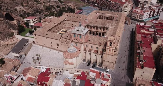 High view of Orihuela in Alicante with old University, mountains and buildings