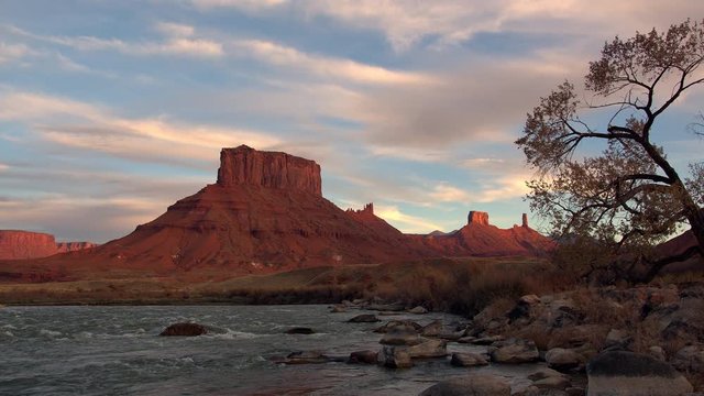 Sunset over the Colorado River looking towards Castleton Tower along the Professor Valley Ridge in the desert of Utah.
