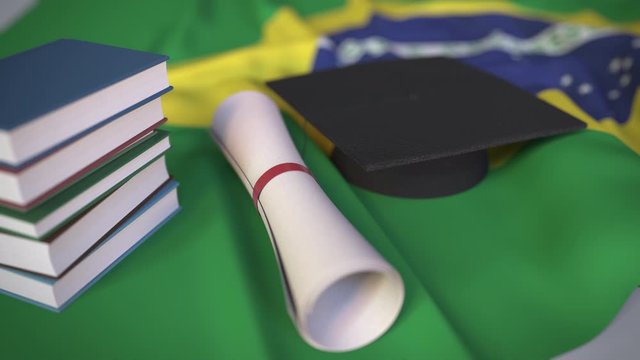 Graduation cap, books and diploma on the Brazilian flag. Higher education in Brazil related conceptual 3D animation