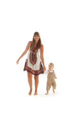 parent teaching baby to walk on white background