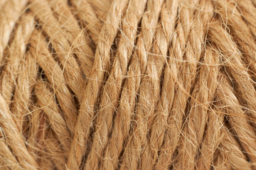 Photo bobbin with thread, rope close-up for texture or background design.