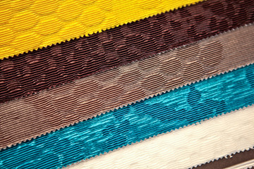 samples of artificial fur carpets of different colors